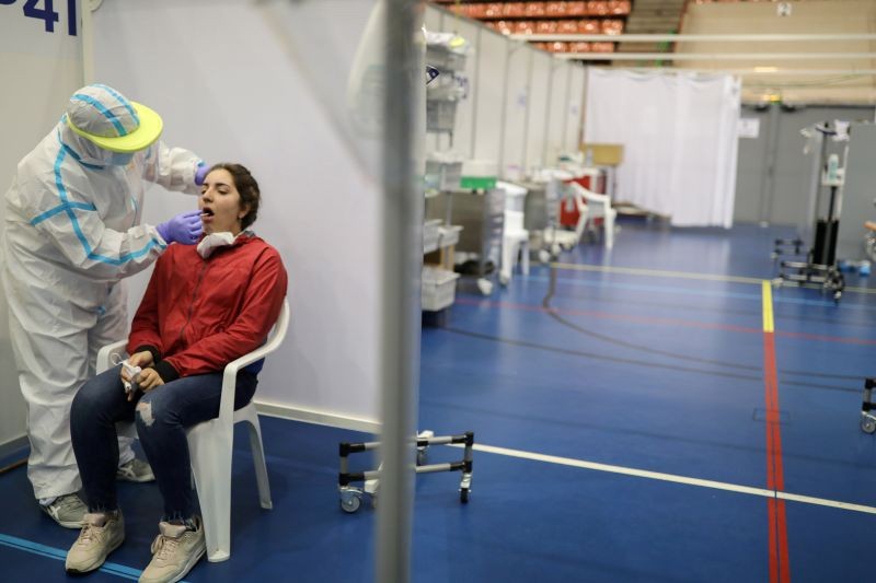 A woman undergoes a test for the coronavirus disease at the Hospital Vall d'Hebron facility in Barcelona, Spain on June 11, 2020. (REUTERS Photo)