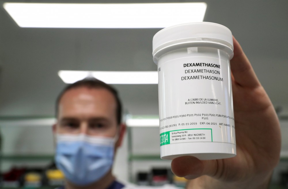 A pharmacist displays a box of Dexamethasone at the Erasme Hospital amid the coronavirus disease (COVID-19) outbreak, in Brussels, Belgium on June 16. (REUTERS/Yves Herman)