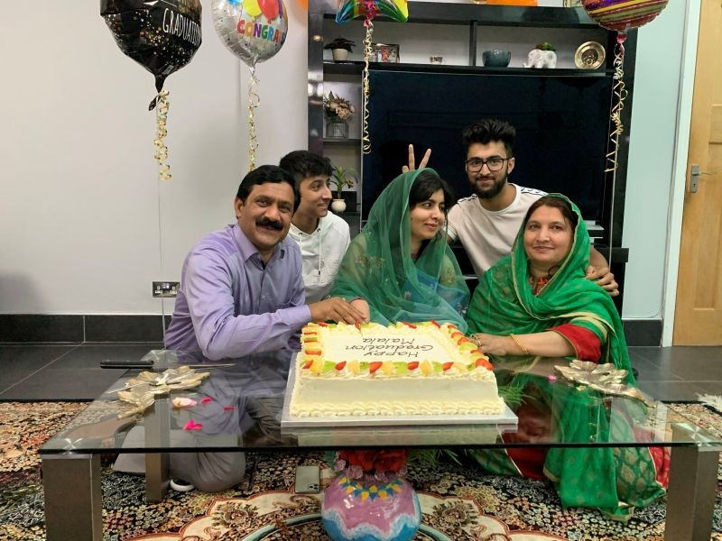 Activist Malala Yousafzai celebrates with family after completing her Philosophy, Politics and Economics degree from Oxford University on June 18, 2020 in this picture taken in an undisclosed location and obtained from social media. (REUTERS Photo)