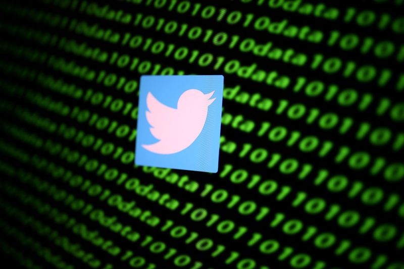 The Twitter logo and binary cyber codes are seen in this illustration taken on November 26, 2019. (REUTERS File Photo)