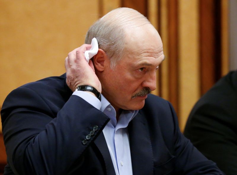 Belarusian President Alexander Lukashenko listens to Russian President Vladimir Putin during their meeting in the Black sea resort of Sochi, Russia on February 7, 2020. (REUTERS File Photo)