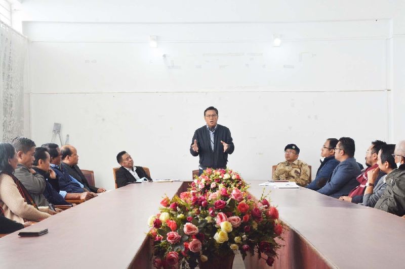 Advisor, School Education, KT Sukhalu addressing the review meeting at the DC's Conference Hall in Zunheboto on June 4. (DIPR Photo)