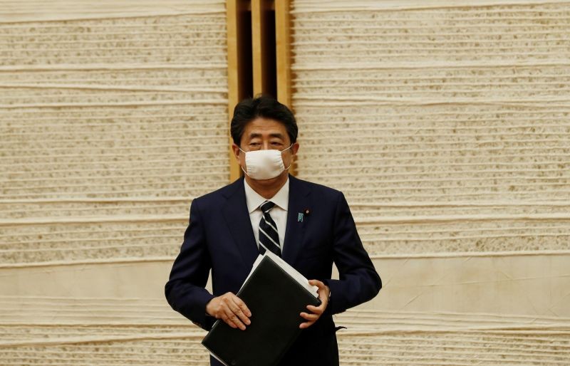 Japan's Prime Minister Shinzo Abe leaves the venue after a news conference on the country's response to the coronavirus disease (COVID-19), in Tokyo, Japan on May 25, 2020. (REUTERS File Photo)