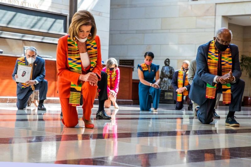 House Speaker Nancy Pelosi (D-CA) and Senate Minority Leader Chuck Schumer (D-NY) and House Majority Leader Steny Hoyer (D-MD) kneel with Congressional Democrats during a moment of silence to honor George Floyd, Breonna Taylor, Ahmaud Arbery and others inside Emancipation Hall after weeks of protests against racial inequality in the aftermath in Minneapolis police custody of Floyd, at the U.S. Capitol in Washington, June 8, 2020. (AP Photo)