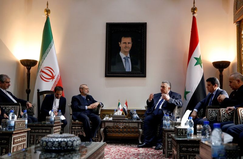 Iranian parliament speaker Ali Larijani meets with Syrian parliament speaker Hammouda Sabbagh in Damascus, Syria on February 16, 2020. (REUTERS File Photo)