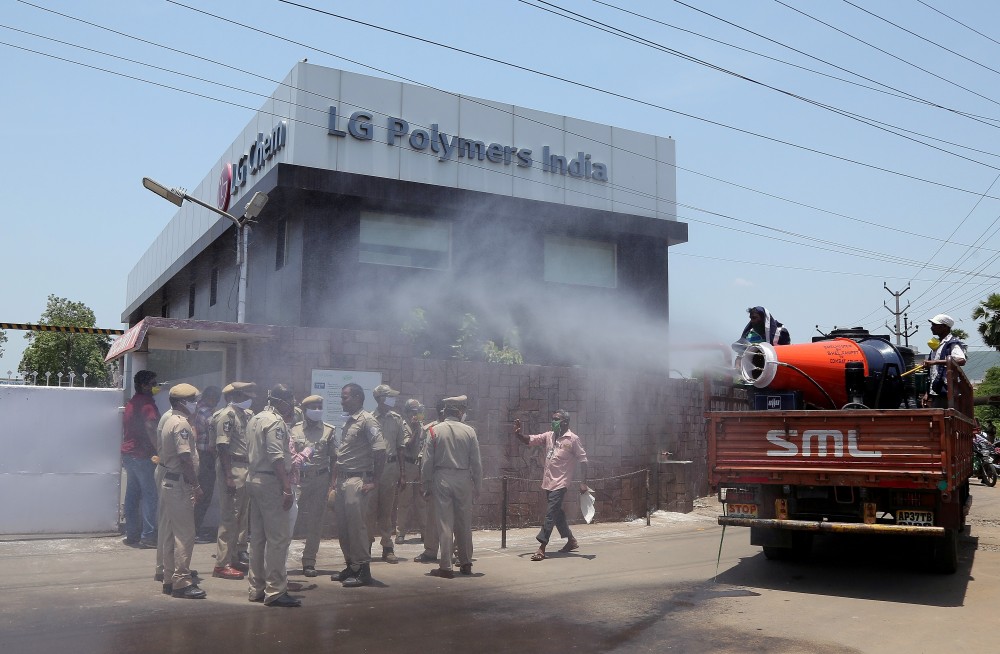 Municipal workers decontaminate outside of the LG Polymers Plant following a gas leak at the plant in Visakhapatnam, India, May 8, 2020. (REUTERS File Photo)