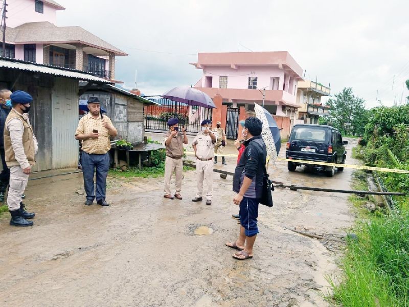 Police personnel sealing off an area at Jotsoma village after a person residing in the village tested positive for COVID-19.