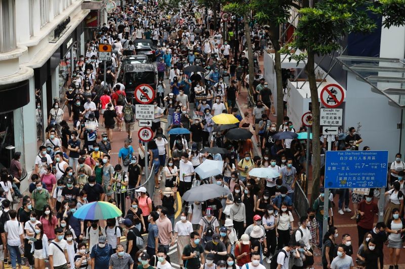 Anti-national security law protesters march at the anniversary of Hong Kong's handover to China from Britain in Hong Kong, China on July 1, 2020. (REUTERS Photo)