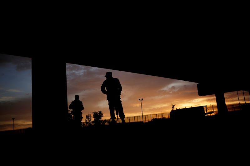 Members of the Mexican National Guard stand near the border fence between Mexico and the U.S. in Ciudad Juarez, Mexico on July 6, 2019. (REUTERS File Photo)