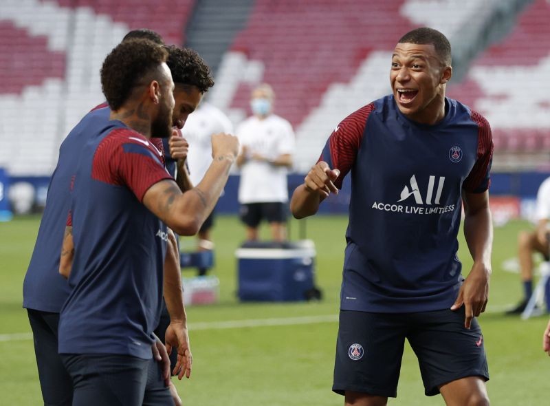 Paris St Germain's Kylian Mbappe and Neymar during training Pool via REUTERS/Matthew Childs