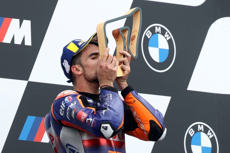 MotoGP - Styrian Grand Prix - Red Bull Ring, Spielberg, Austria - August 23, 2020 Red Bull KTM Tech 3's Miguel Oliveira celebrates his win on the podium REUTERS/Lisi Niesner
