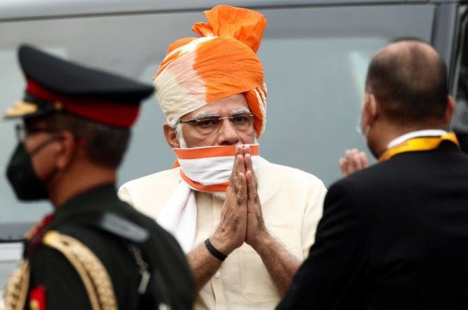 Prime Minister Narendra Modi greets officers as he arrives to attend Independence Day celebrations at the historic Red Fort in Delhi. Photograph: Adnan Abidi/Reuters
