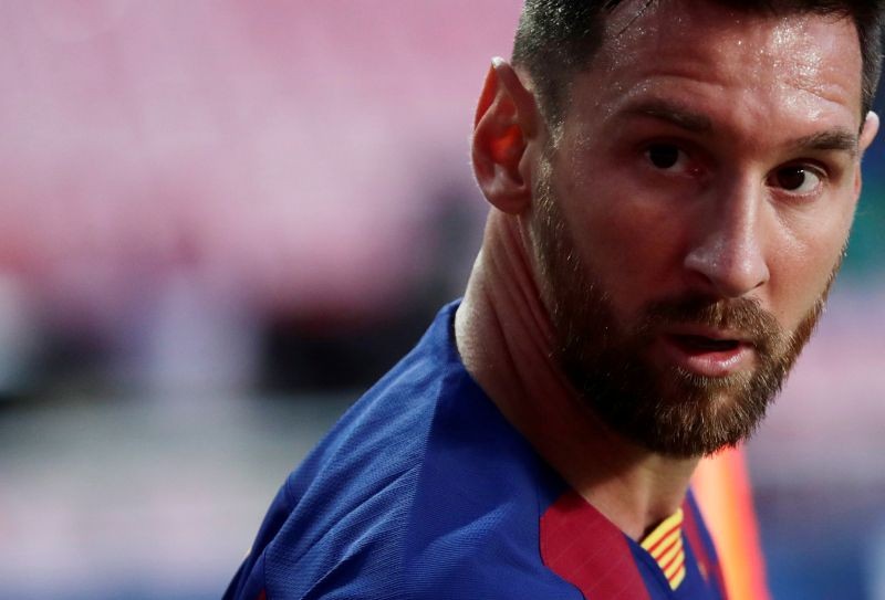 FILE PHOTO: Soccer Football - Champions League - Quarter Final - FC Barcelona v Bayern Munich - Estadio da Luz, Lisbon, Portugal - August 14, 2020  Barcelona's Lionel Messi, as play resumes behind closed doors following the outbreak of the coronavirus disease (COVID-19)  Manu Fernandez/Pool via REUTERS