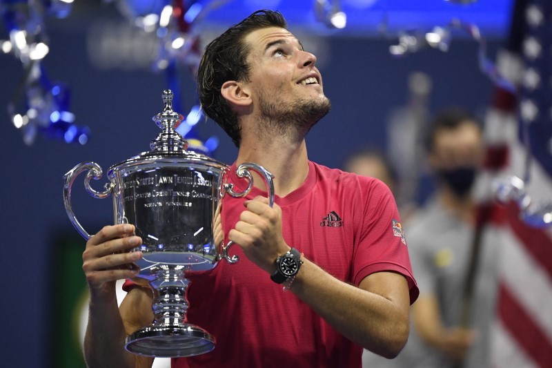 Sep 13 2020; Flushing Meadows, New York, USA; Dominic Thiem of Austria celebrates with the championship trophy after his match against Alexander Zverev of Germany (not pictured) in the men's singles final match on day fourteen of the 2020 U.S. Open tennis tournament at USTA Billie Jean King National Tennis Center. Danielle Parhizkaran-USA TODAY Sports