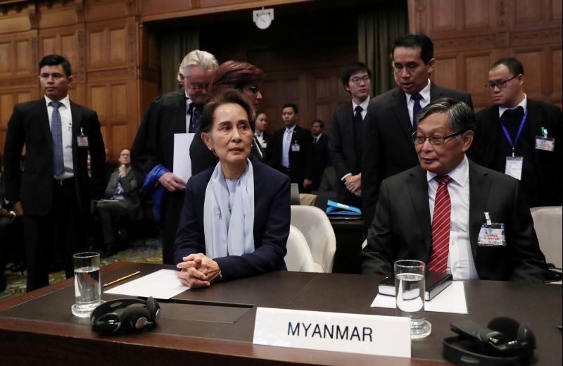 FILE PHOTO: Myanmar's leader Aung San Suu Kyi attends a hearing on the second day of hearings in a case filed by Gambia against Myanmar alleging genocide against the minority Muslim Rohingya population, at the International Court of Justice (ICJ) in The Hague, Netherlands December 11, 2019.  REUTERS/Yves Herman