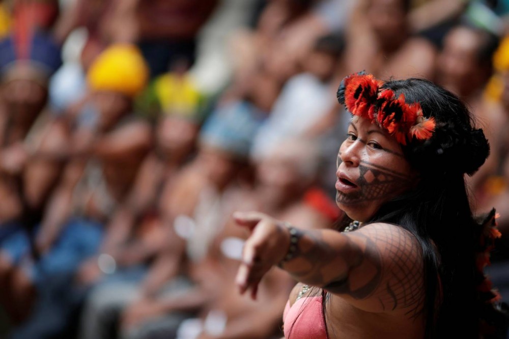 Alessandra, indigenous woman of Munduruku tribe speaks during a press conference to ask authorities for protection for indigenous land and cultural rights in Brasilia, Brazil November 21, 2019. REUTERS/Ueslei Marcelino