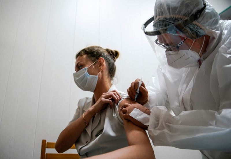 A medic at a Russian regional hospital in Tver receives the  "Sputnik-V" vaccine against the new coronavirus in Tver, Russia October 12, 2020.  REUTERS/Tatyana Makeyeva/File Photo