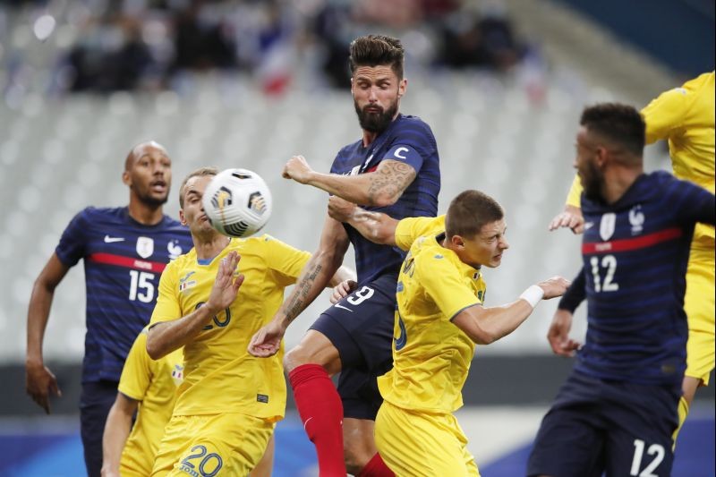 Soccer Football - International Friendly - France v Ukraine - Stade de France, Paris, France - October 7, 2020 France's Olivier Giroud in action with Ukraine's Vitali Mykolenko REUTERS/Benoit Tessier