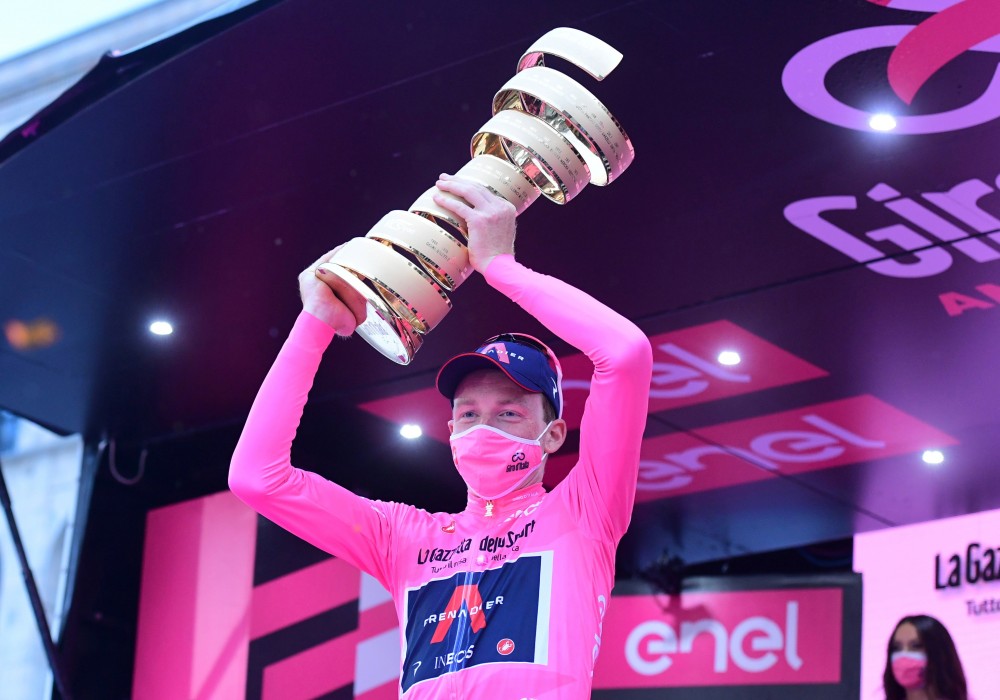 Cycling - Giro d'Italia - Stage 21 - Cernusco sul Naviglio to Milan, Italy - October 25, 2020  UCI WorldTeam Ineos Grenadiers' Tao Geoghegan Hart celebrates with the trophy after winning the Giro d'Italia  REUTERS/Stringer