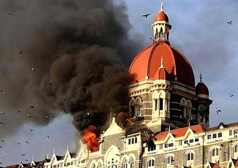 A file photo of 26/11 Attacks on Mumbai. Ten heavily armed Pakistani terrorists had landed undetected in Mumbai's Badhwar Park in Colaba from the sea Nov 26, 2008, and laid siege to several key locations, including Chhatrapati Shivaji Terminus, Taj M. Image Source: IANS News
