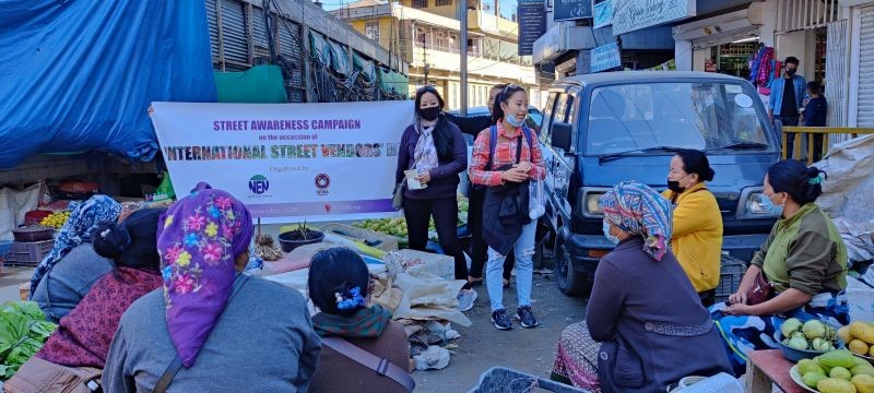 Street awareness campaign carried out by North East Network (NEN), Nagaland in collaboration with Self Employed Women Association (SEWA), Nagaland in Kohima on November 14. (Photo Courtesy: NEN)