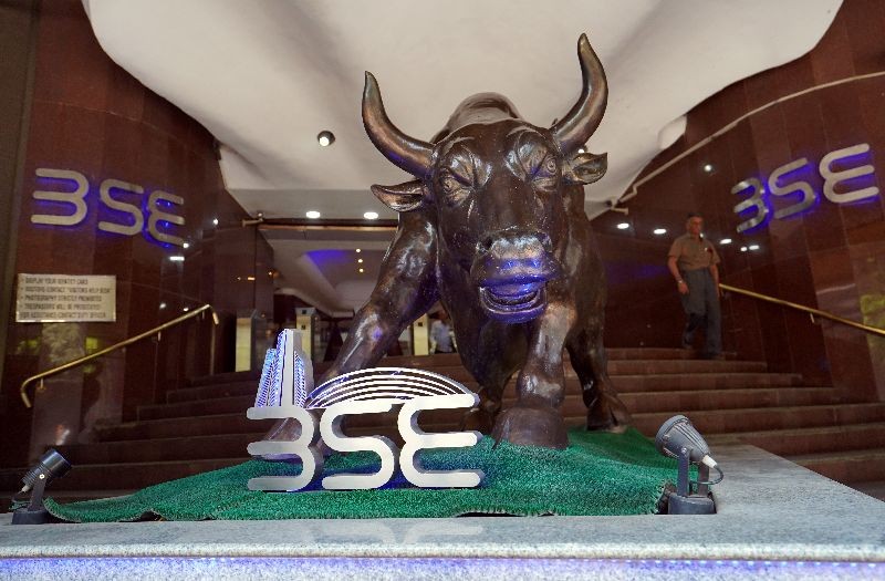 A man walks out of the Bombay Stock Exchange (BSE) building in Mumbai, India, February 28, 2020. REUTERS/Hemanshi Kamani/File Photo