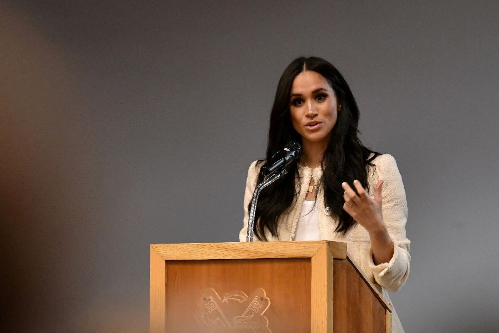 Britain's Meghan, Duchess of Sussex speaks during a school assembly as part of a visit to Robert Clack School in Essex, Britain March 6, 2020, in support of International Women's Day. Ben Stansall/Pool via REUTERS/File Photo
