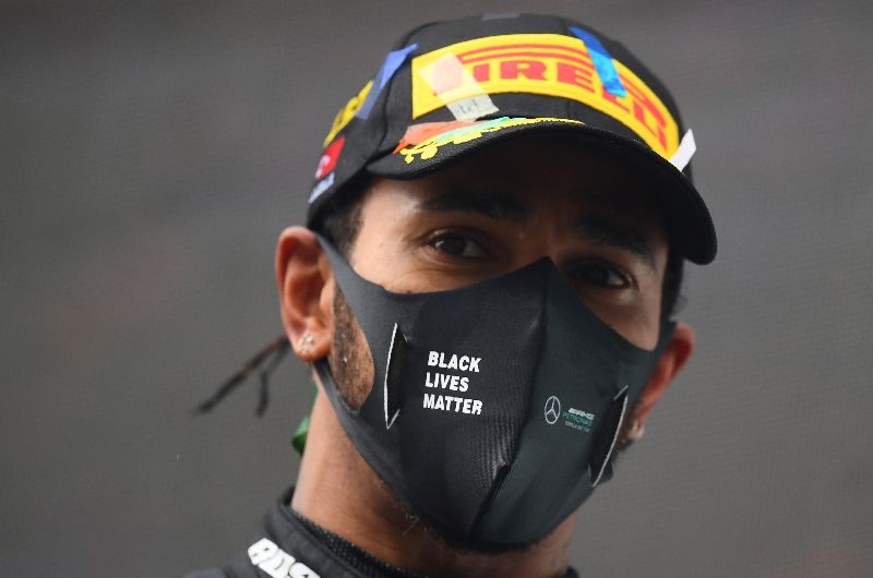 Formula One F1 - Turkish Grand Prix - Istanbul Park, Istanbul, Turkey - November 15, 2020 Mercedes' Lewis Hamilton celebrates after winning the race and the world championship Pool via REUTERS/Clive Mason/File Photo