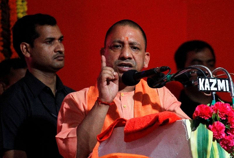 Yogi Adityanath, Chief Minister of India's most populous state of Uttar Pradesh, addresses the audience after inaugurating power projects in Allahabad, India, June 4, 2017. REUTERS/Jitendra Prakash