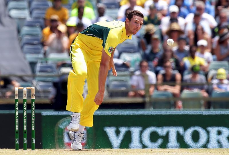 Australia's Josh Hazelwood bowls a delivery during the One Day International cricket match against India in Perth January 12, 2016. REUTERS/Bill Hatto/Files