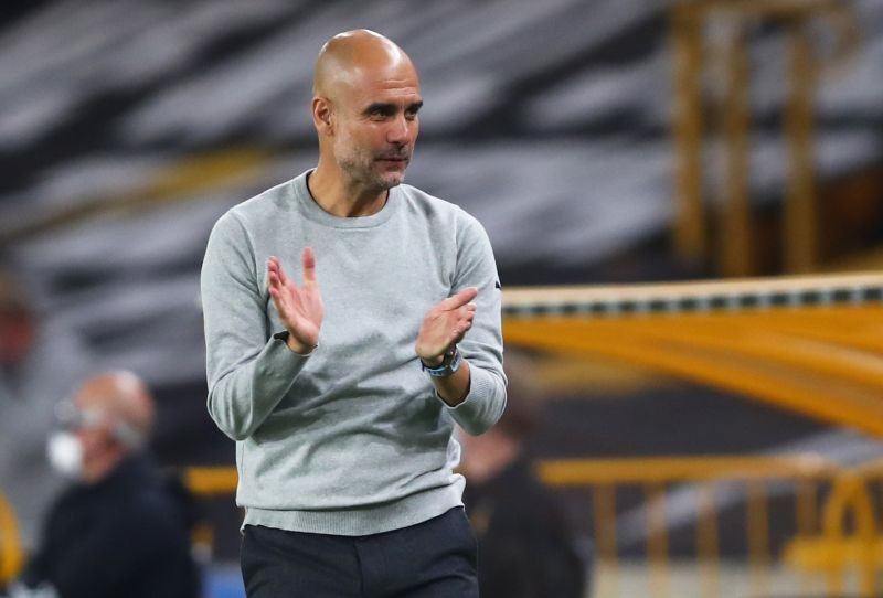Manchester City manager Pep Guardiola celebrates their second goal Pool via REUTERS/Marc Atkins/File Photo