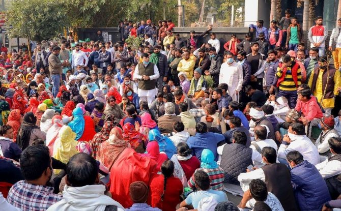 Farmers stage a protest against the new farm laws, in Sector 6, Noida. Photograph: PTI Photo