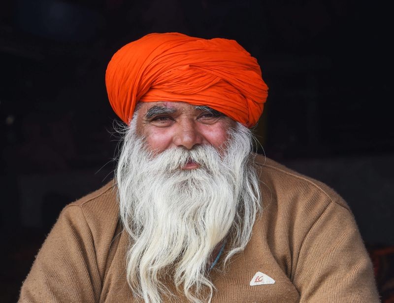 New Delhi: An elderly farmer during the ongoing protest against the farm laws at Singhu Border, in New Delhi, Tuesday, Dec. 22, 2020. (PTI Photo)