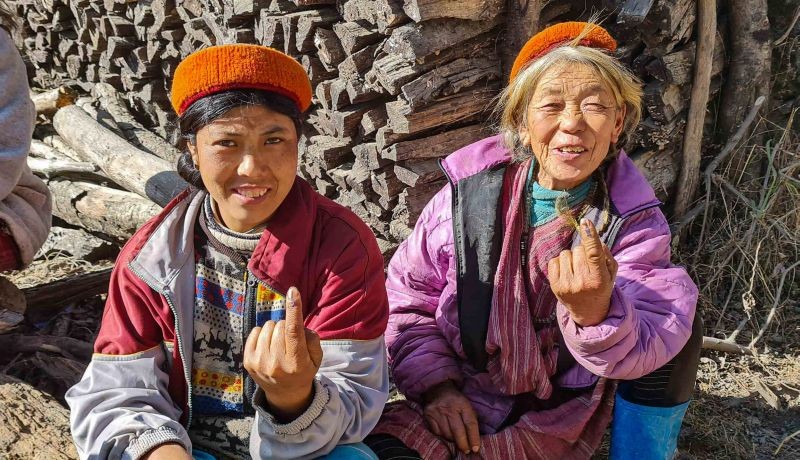 Tawang: Voters show their fingers marked with indelible ink after casting their votes during the Panchayat Polls 2020 in Tawang, Tuesday, Dec. 22, 2020. (PTI Photo)