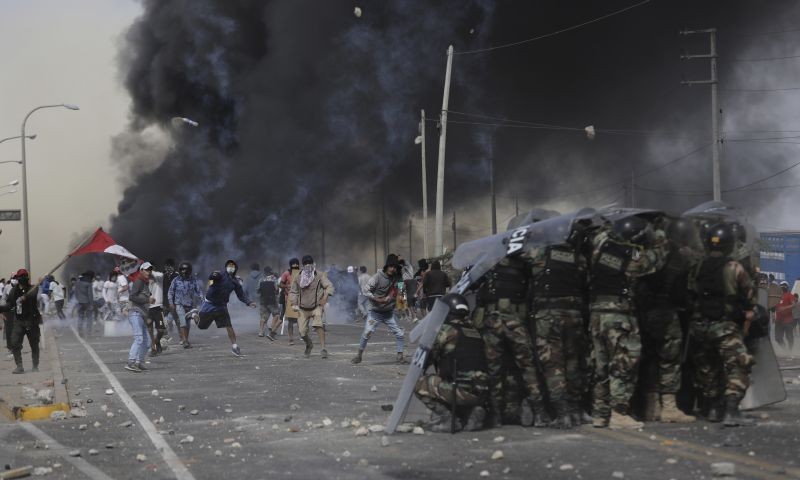 Ica : Farmworkers throw rocks at police trying to break up their blockage of the Pan-American South Highway as they protest the Agricultural Promotion Law in the Barrio Chino neighborhood of Peru's Ica province, Tuesday, Dec. 22, 2020.  AP/PTI