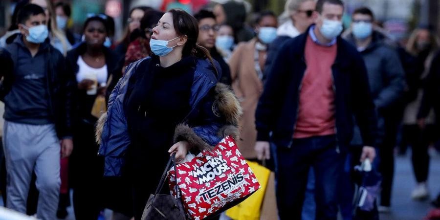 Shoppers walk along a very busy Regent Street in London. (Photo | AP)