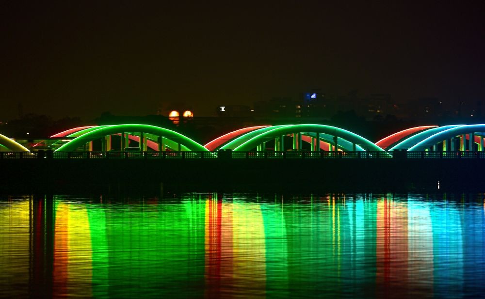 Chennai: Napier bridge gets dynamic lighting system to mark new yer celebration ,in Chennai, Thursday, Dec. 31, 2020. (PTI Photo/R Senthil Kumar)