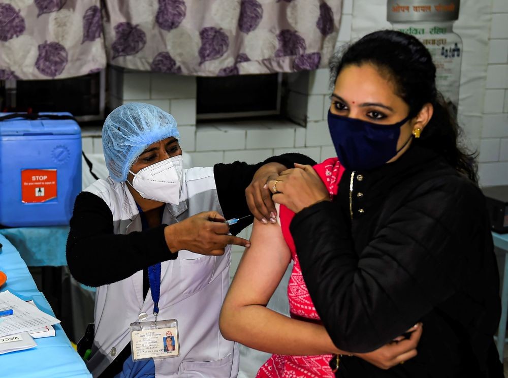 New Delhi: A health worker conducts the dry run of COVID-19 vaccination at a healthcare center in Daryaganj, New Delhi, Saturday, Jan. 2, 2021. (PTI Photo/Kamal Singh)