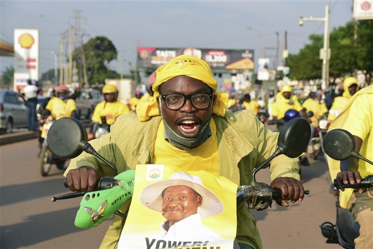 A supporter of Ugandan President Yoweri Kaguta Museveni celebrates in Kampala, Uganda, on Saturday after their candidate was declared the winner of the presidential elections. Nicholas Bamulanzeki / AP