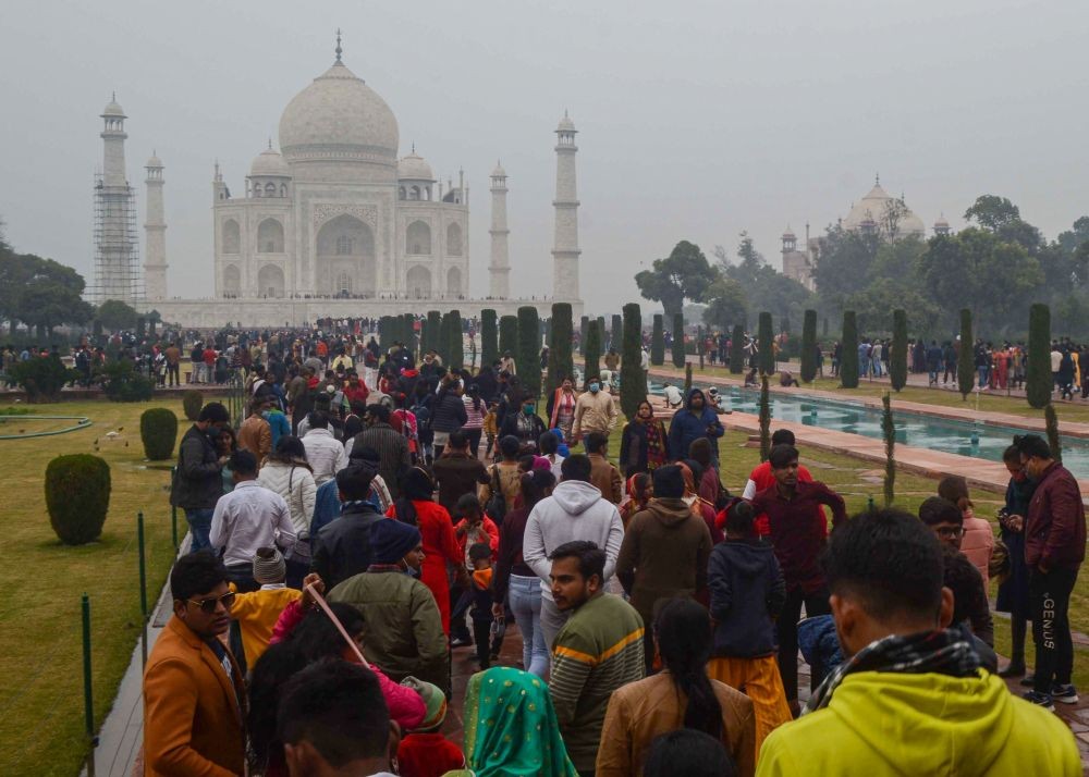 Agra: Tourists visit Taj Mahal, amid coronavirus pandemic, in Agra, Saturday, Jan. 02, 2021, (PTI Photo)