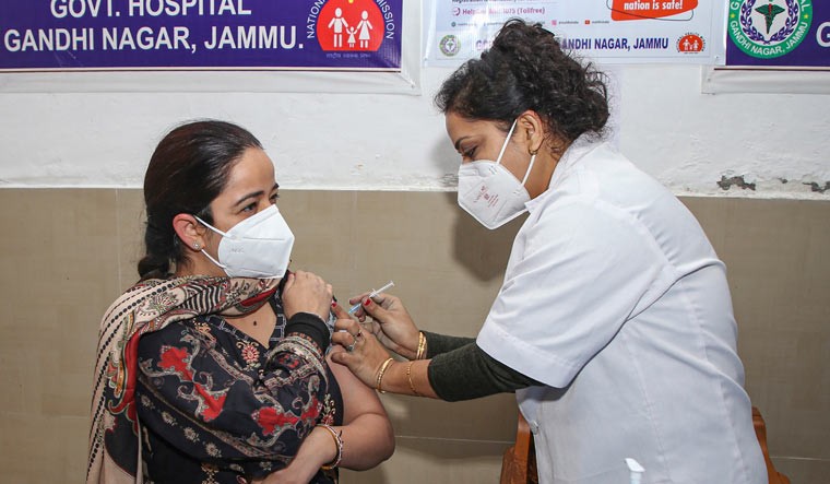 A medic administers COVID vaccine to a doctor in Jammu | PTI