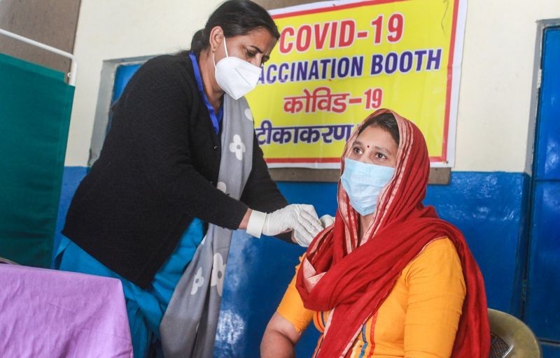 A medic administers the second dose of Covishield vaccine to a frontline worker, in Gurugram on February 15, 2021. (PTI Photo)