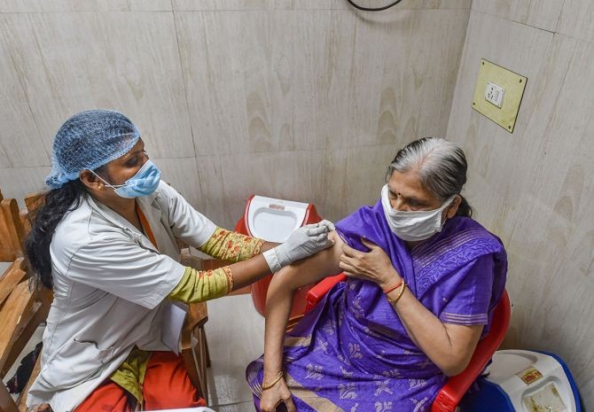 A medic administers COVID-19 vaccine to a senior citizen at Civil Hospital in Lucknow, on Thursday. Photograph: Nand Kumar/PTI Photo