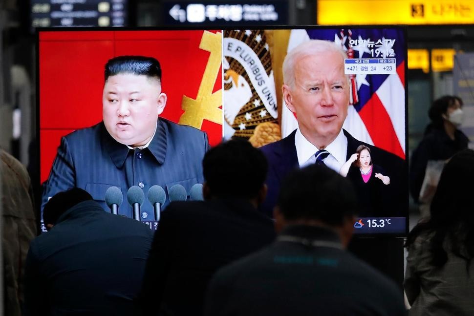 File Photo: Commuters watch a TV showing a file image of North Korean leader Kim Jong Un and U.S. President Joe Biden during a news program at the Suseo Railway Station in Seoul, South Korea, Friday. March 26, 2021. (AP File Photo)