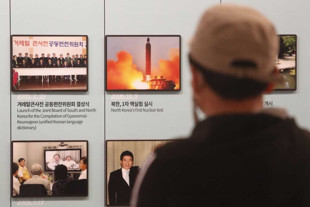A photo showing North Korea's missile launch is displayed at the Unification Observation Post in Paju, near the border with North Korea, South Korea, Wednesday, March 24, 2021. North Korea fired short-range missiles this past weekend, just days after the sister of Kim Jong Un threatened the United States and South Korea for holding joint military exercises. (AP Photo/Ahn Young-joon)