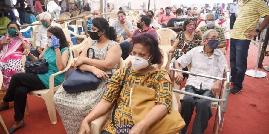Senior citizens wait to receive the first dose of COVID-19 vaccine during the second phase of a countrywide inoculation drive at BKC in Mumbai Tuesday March 2 2021. (Photo | PTI)