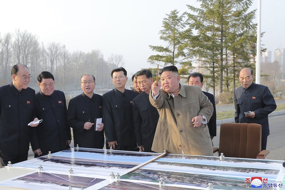 In this undated photo provided by the North Korean government, North Korean leader Kim Jong Un, front right, visits the site of a planned area of riverside terraced houses in Pyongyang, North Korea. Independent journalists were not given access to cover the event depicted in this image distributed by the North Korean government. The content of this image is as provided and cannot be independently verified. Korean language watermark on image as provided by source reads: "KCNA" which is the abbreviation for Korean Central News Agency. (Korean Central News Agency/Korea News Service via AP)