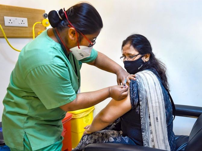 A medic administers the first dose of the COVID-19 vaccine at the Max Hospital in Saket, New Delhi, April 1, 2021. Photograph: Kamal Singh/PTI Photo