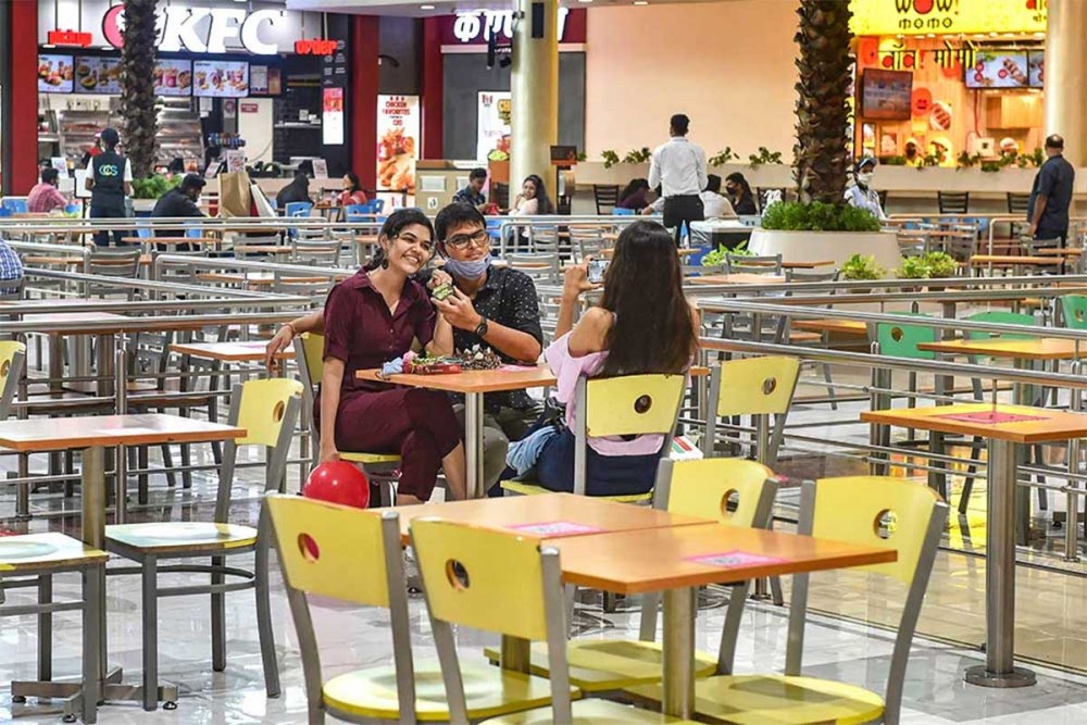 Visitors at a food court in a mall in Thane. Photograph: Mitesh Bhuvad/PTI Photo
