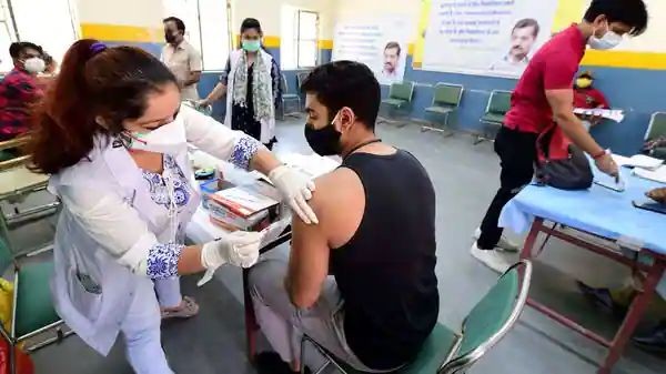 A medic administers a dose of COVID-19 vaccine to a young person, at a vaccination centre in New Delhi (Image for representation). (PTI)